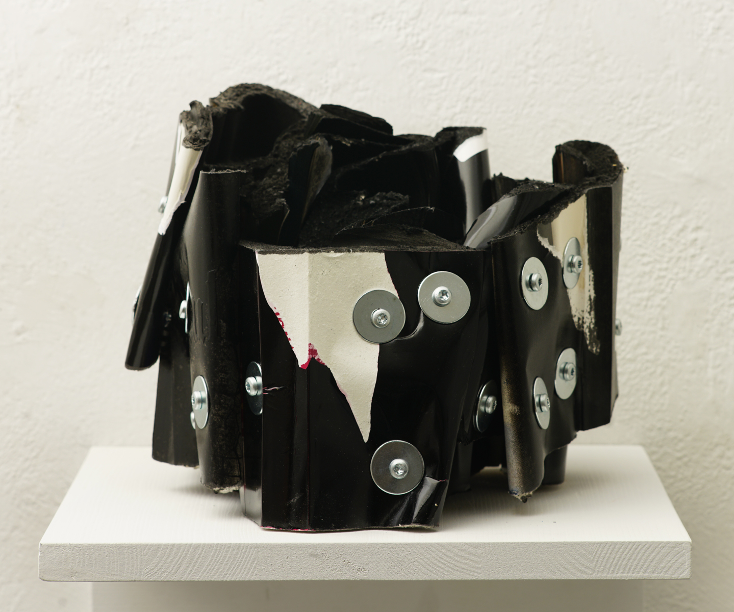 Empire of Sins and Souls, cut books (varnished black), screws, app.: 26 x 20 x 20 cm, 2025